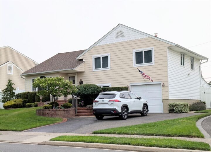 Property Photo:  22 Pembroke Drive  NY 11758 