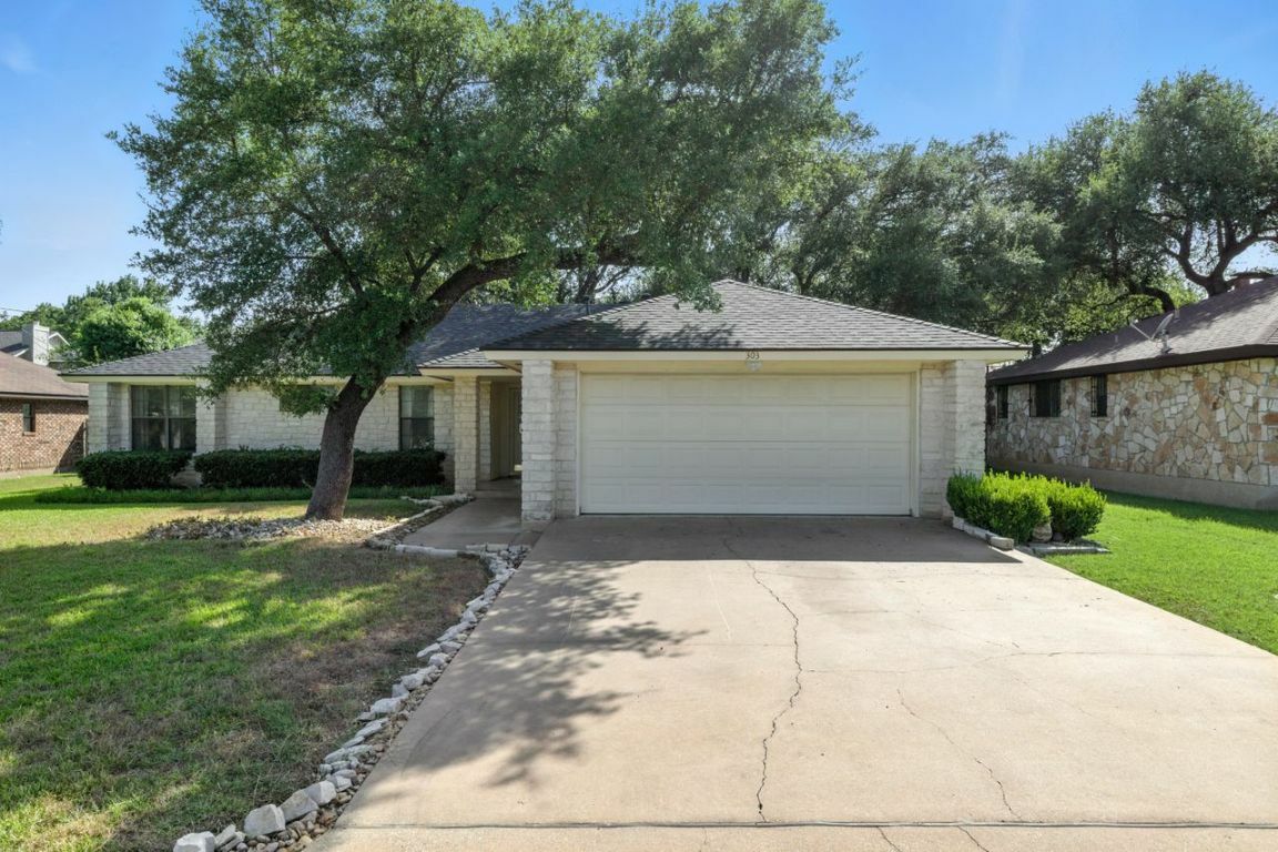 Property Photo:  303 Woodstone Drive  TX 78628 