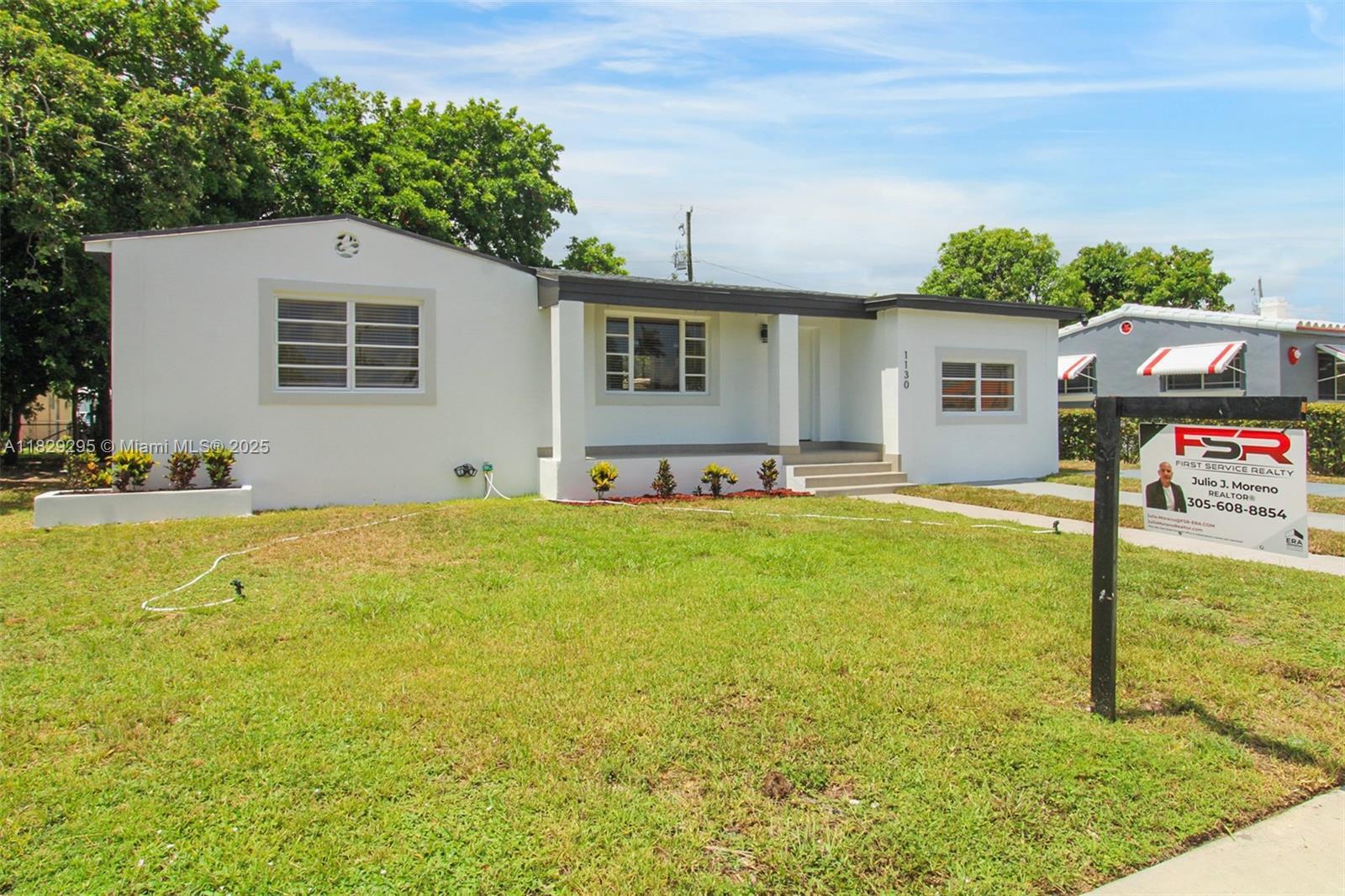 Property Photo: 1130 NW 91 St FL 33150
