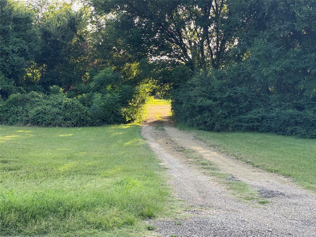 Property Photo: 877 Farm Road 900 N TX 75478