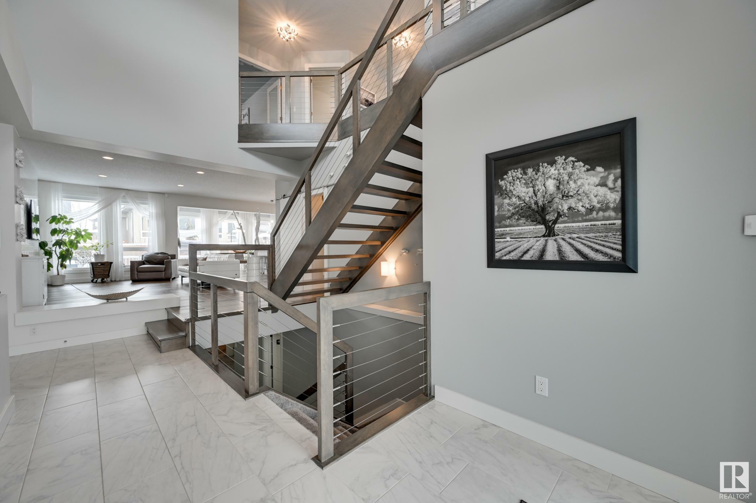 Property Photo: 1311 Hainstock Way SW AB T6W 3B6