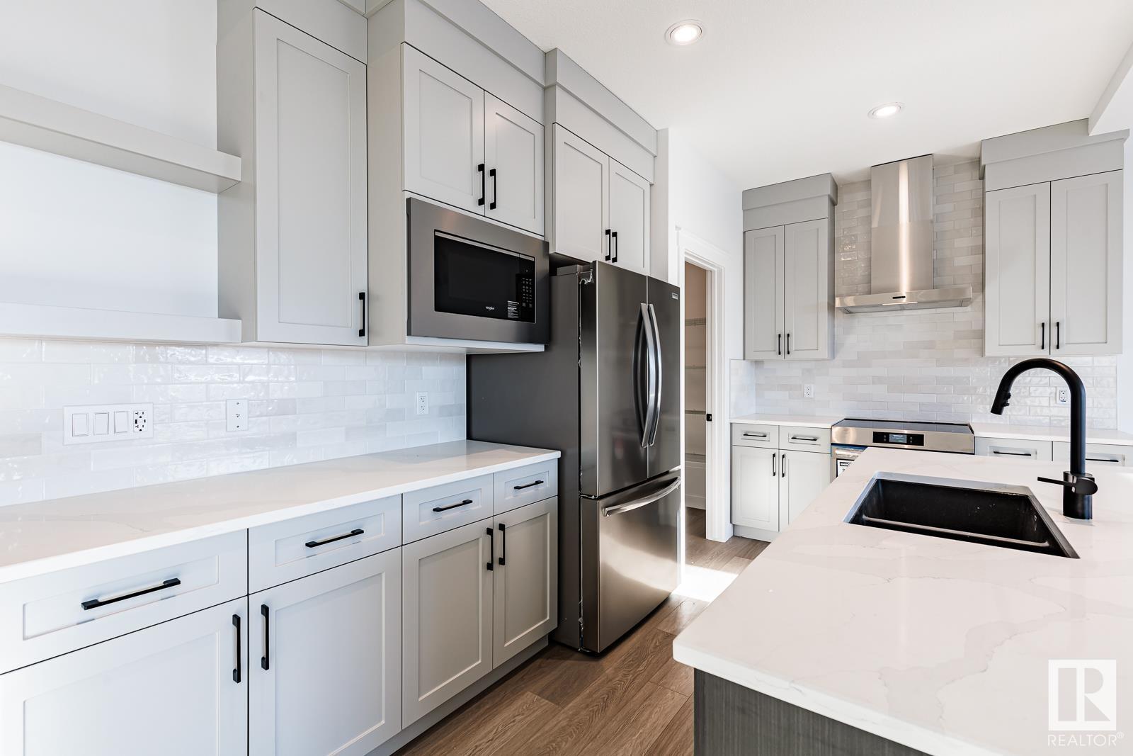 Property Photo: 15679 18 Avenue SW AB T6W 5E1