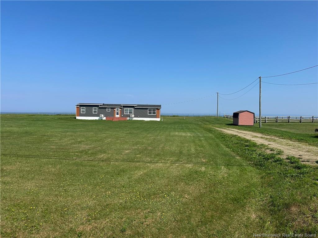 Property Photo:  493 Rue Acadie Street  NB E8N 1C6 