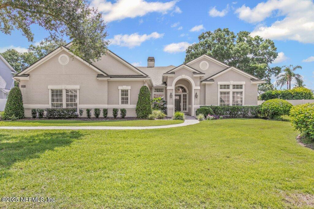 Property Photo: 205 N Checkerberry Way FL 32259