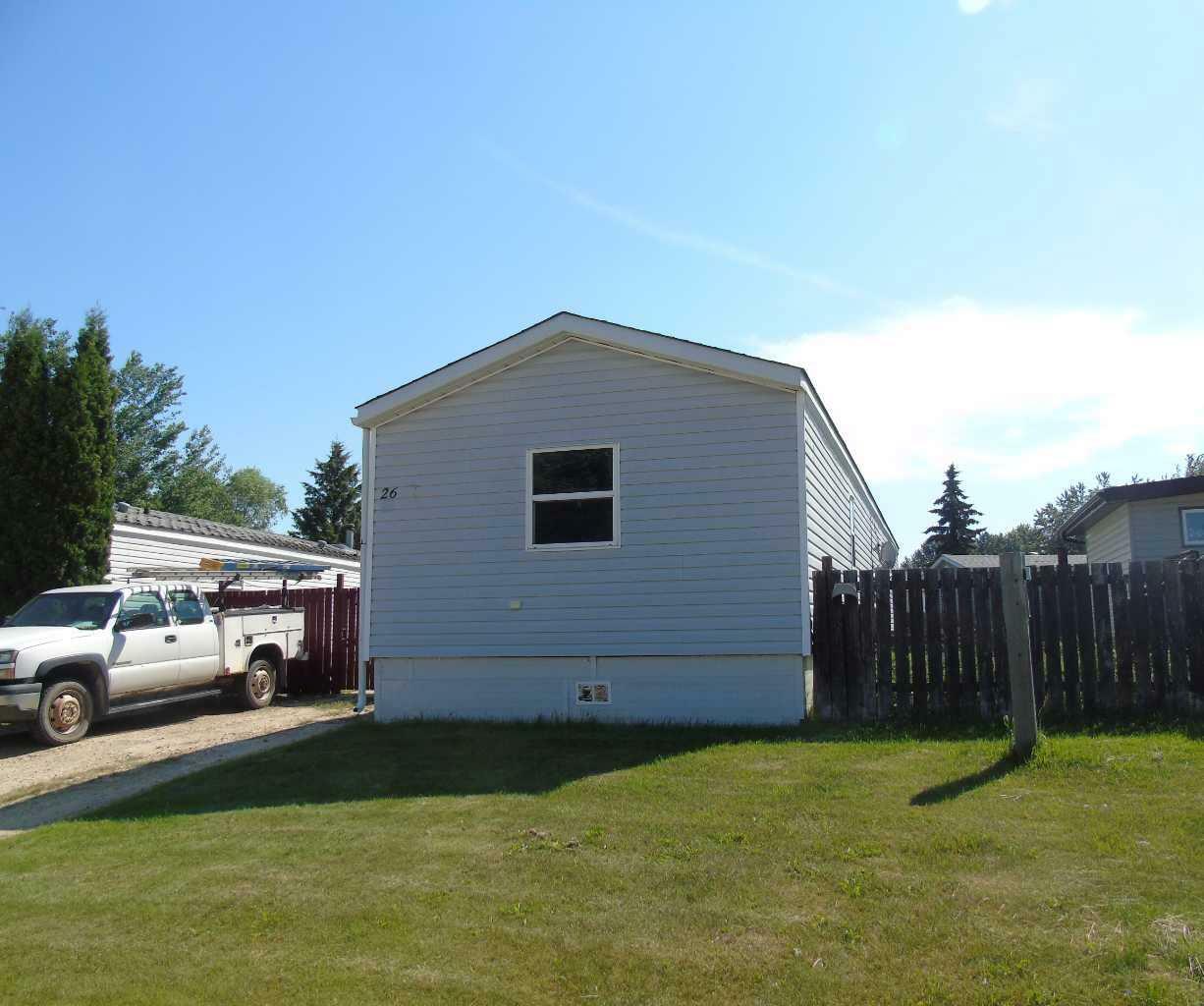 Property Photo:  812 6 Avenue SW 26  AB T0G 2A1 