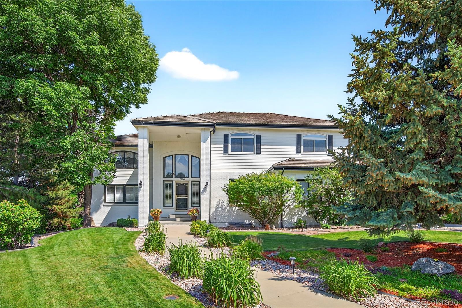 Property Photo: 7120 W Princeton Avenue CO 80235