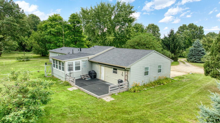 Property Photo:  8756 Portage Lake Road  MI 49259 