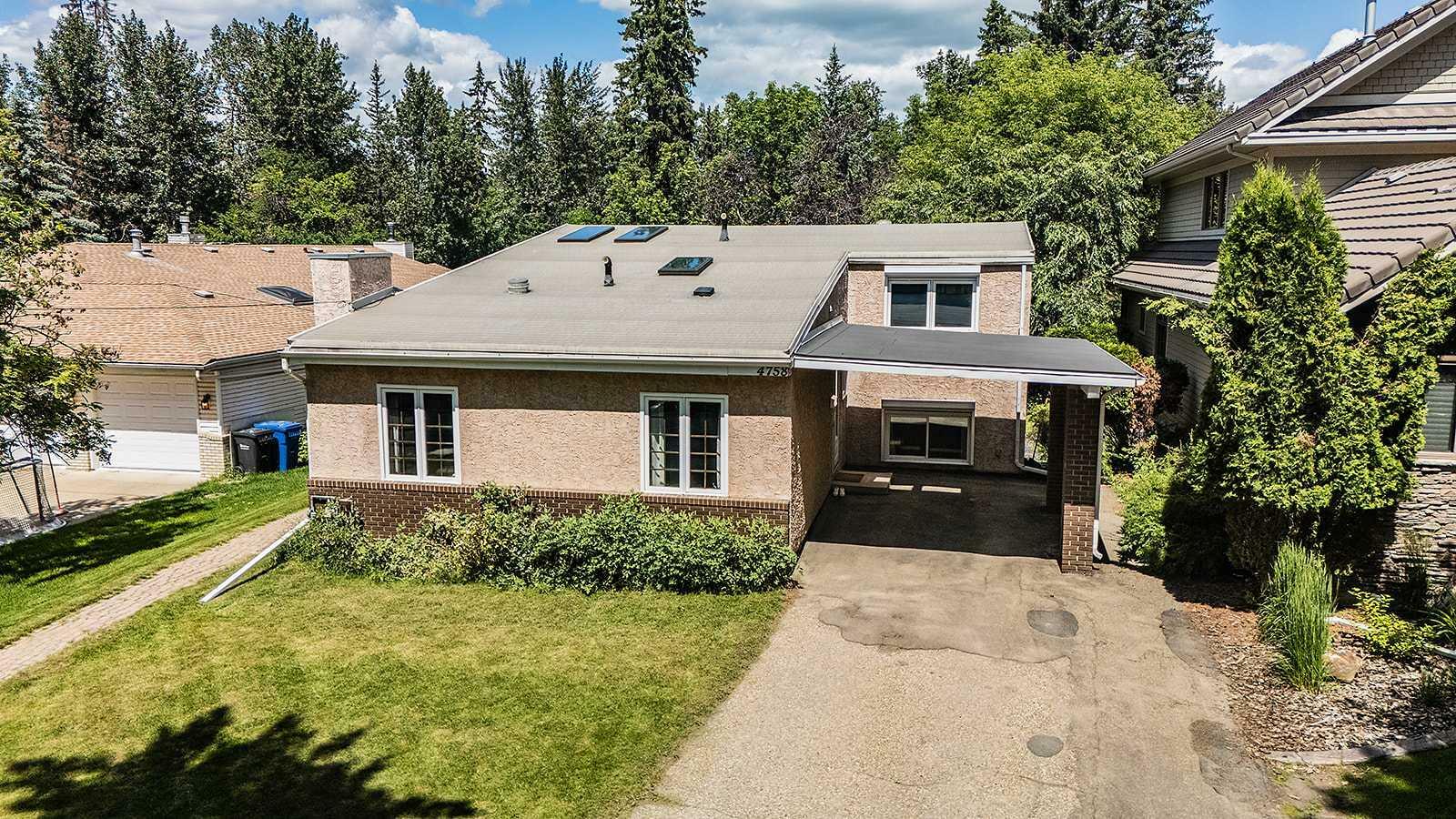 Property Photo: 4758 56 Street AB T4N 2K3