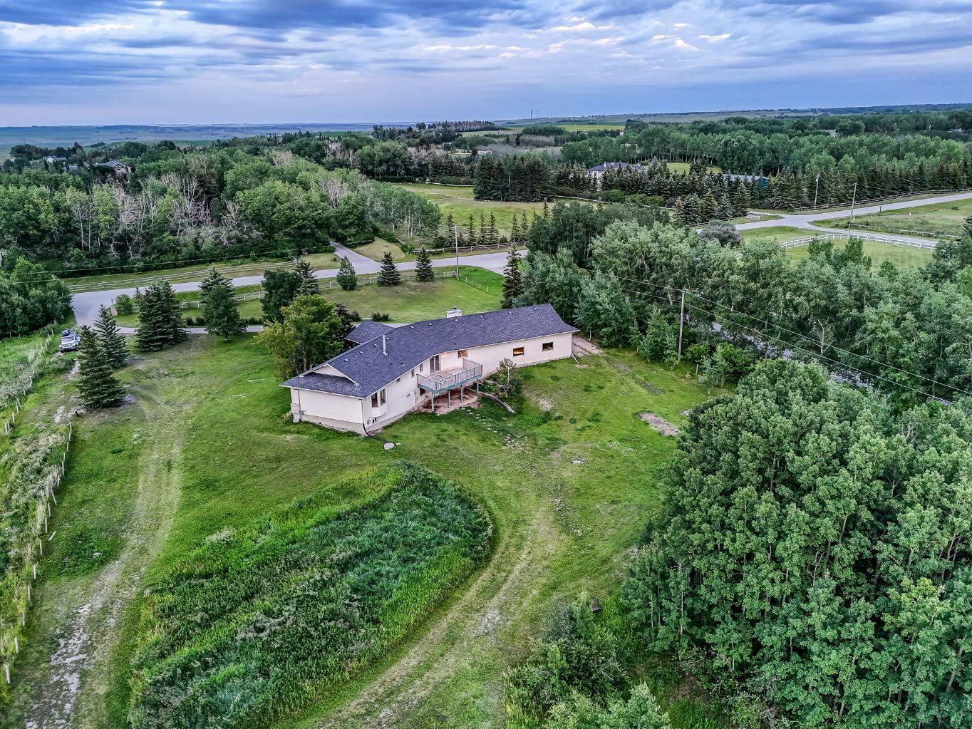 Photo de la propriété: 262107 Poplar Hill Drive AB T3R 1C7