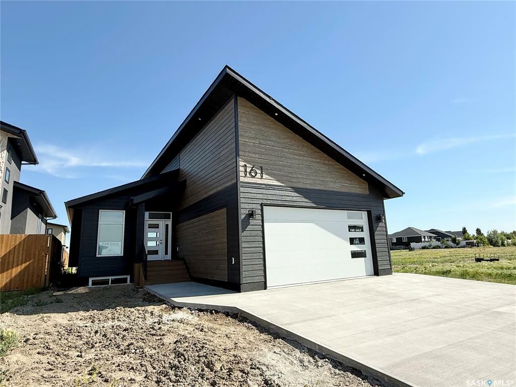 Property Photo: 161 Delaet Drive SK S4H 3B9