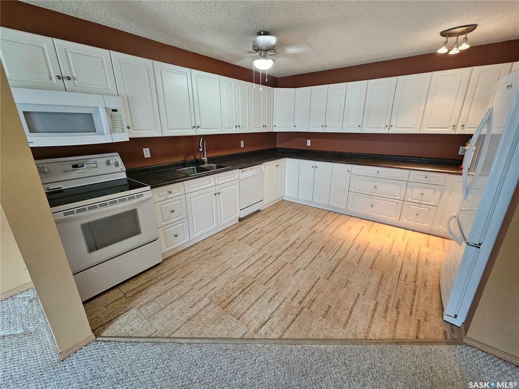 Property Photo: 55 Wood Lily Drive 204 SK S6J 1H1