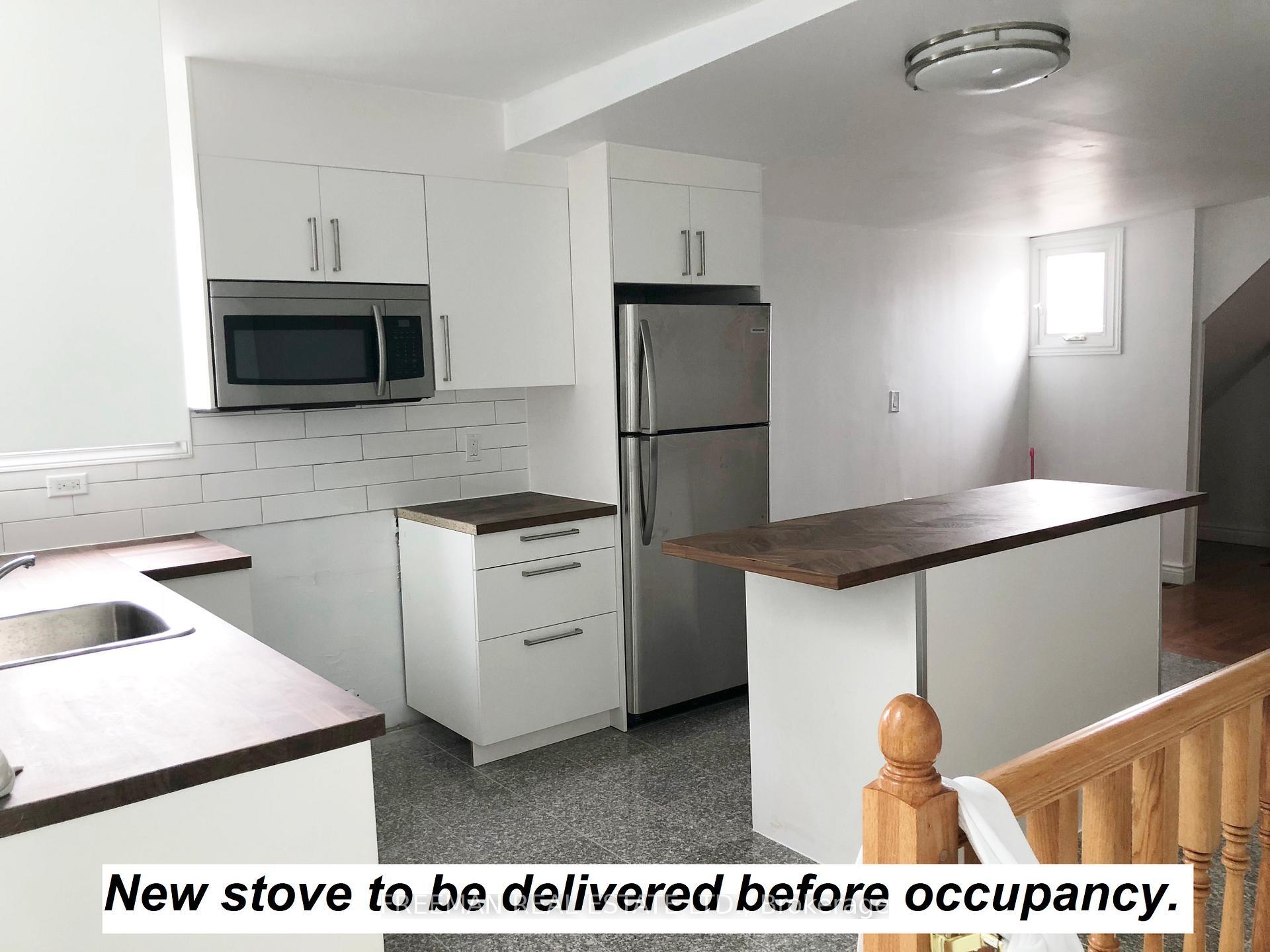 Property Photo: 1022 Gerrard Street E 3 ON M4M 1Z5