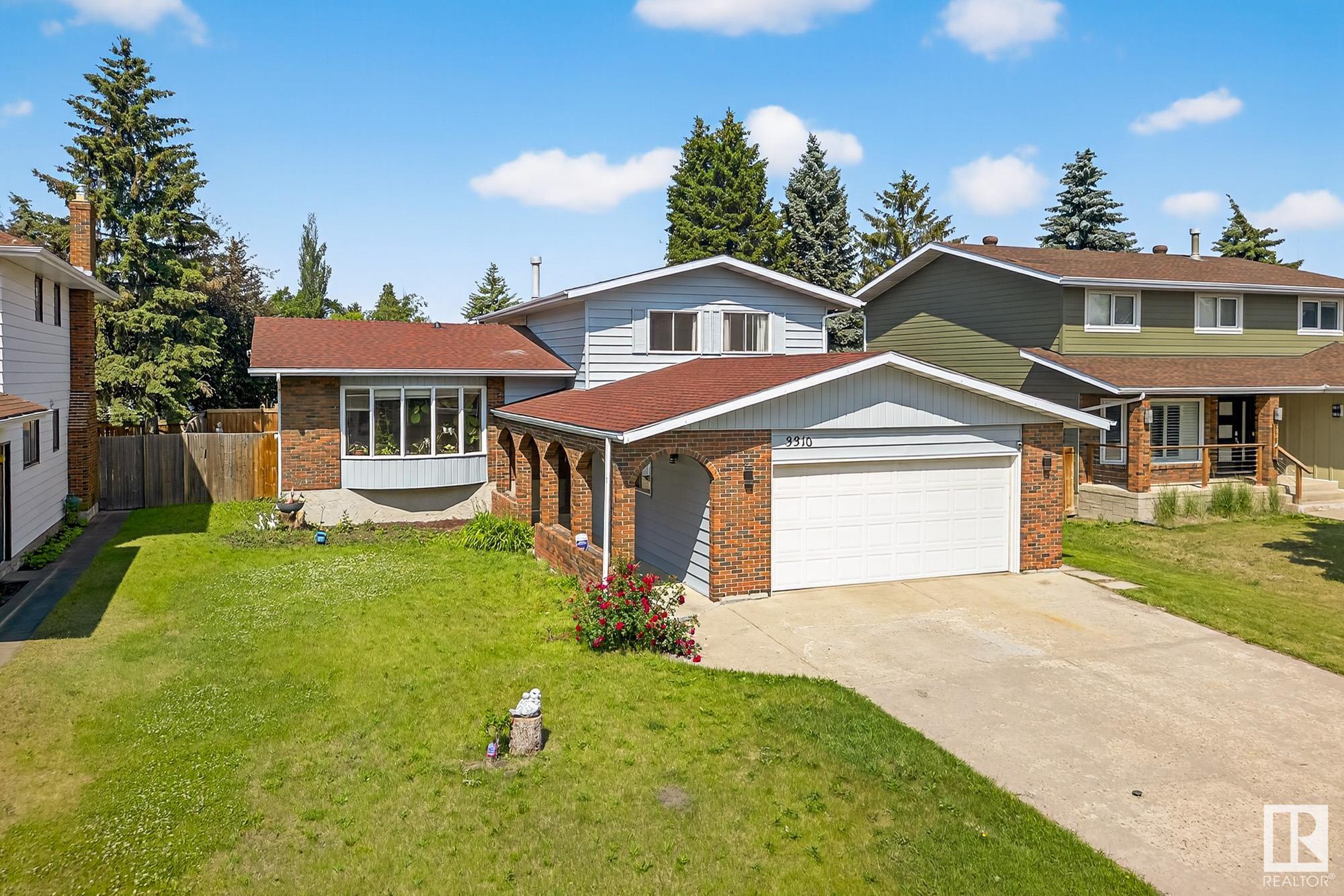 Property Photo:  3310 113A Street NW  AB T6J 3V8 
