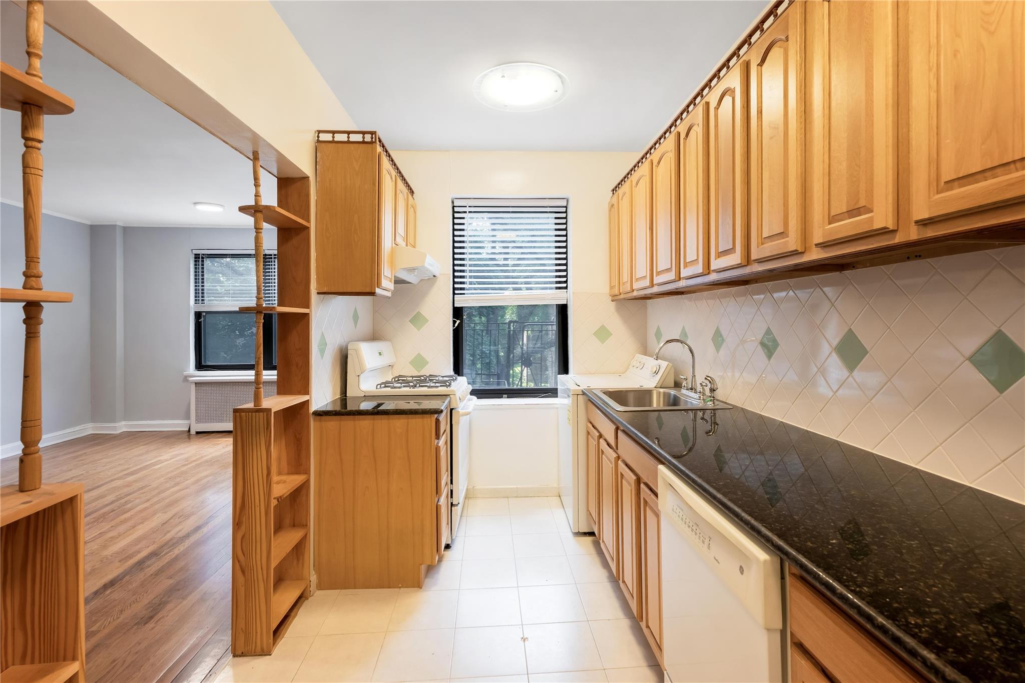 Property Photo:  76-12 Ditmars Boulevard B3  NY 11370 
