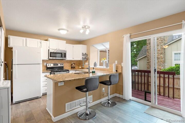 Property Photo: 18131 E Arizona Avenue B CO 80017