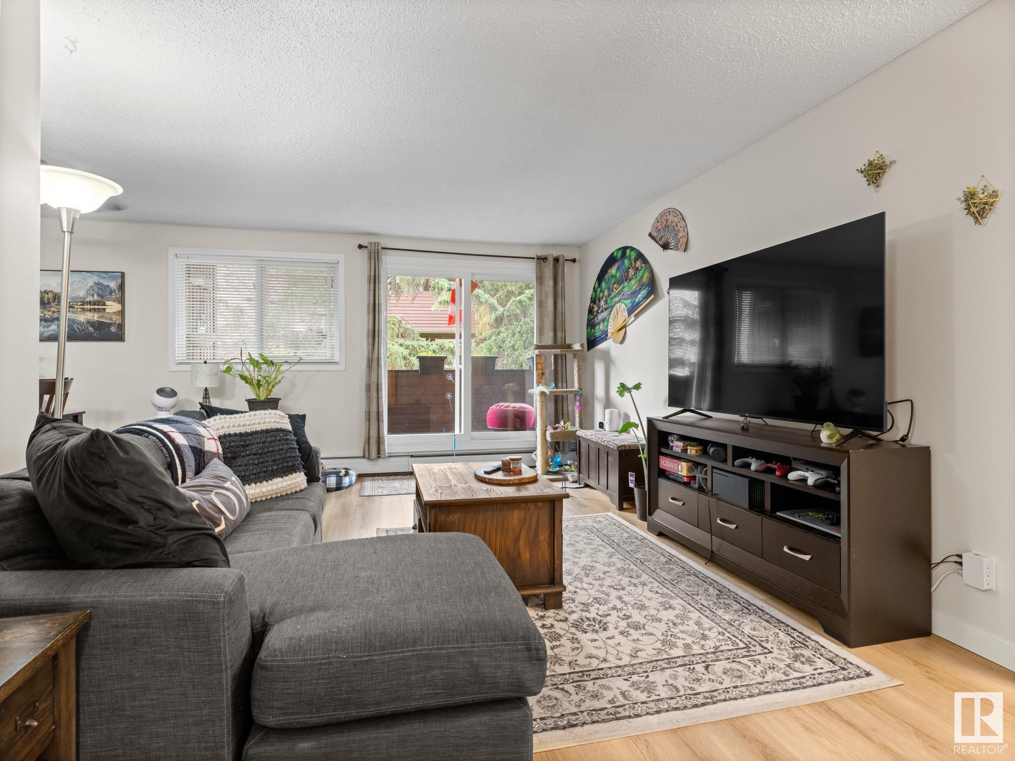 Property Photo:  2323 119 Street NW 219  AB T6J 4E2 