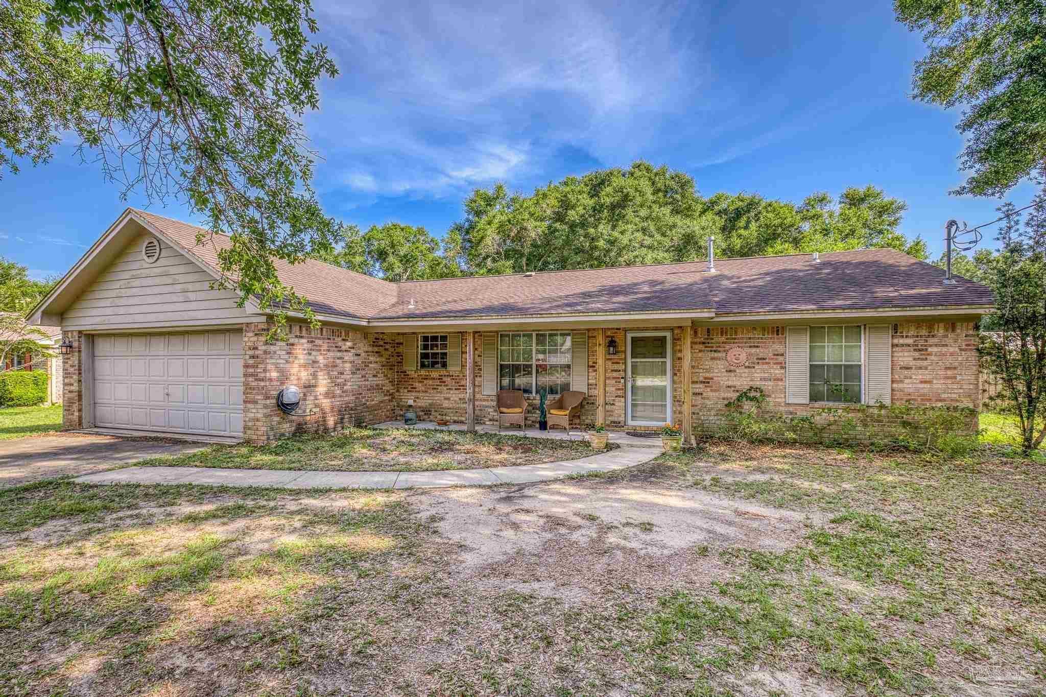 Property Photo: 5843 Ibis Rd FL 32583