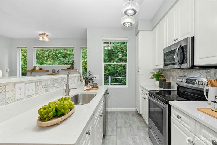 Property Photo:  15150  140th Way SE K103  WA 98058 