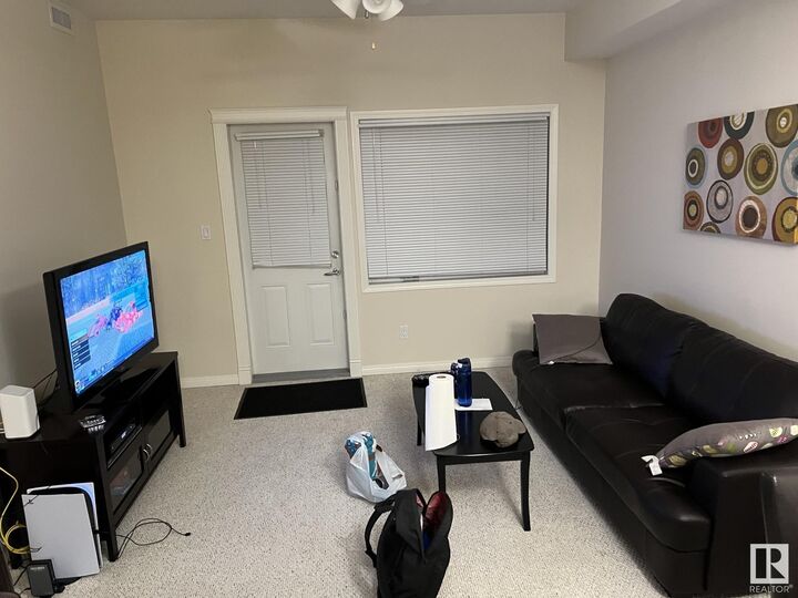 Property Photo: 8702 Southfort Drive 312 AB T8L 4R6