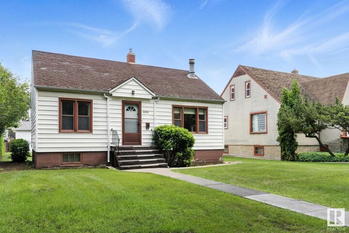 Property Photo:  11039 107 Street NW  AB T5H 2Z6 