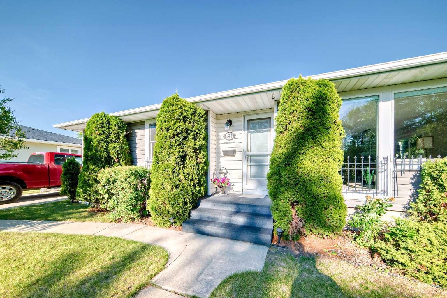 Property Photo:  143 Waskatenau Crescent SW  AB T3C 2X7 