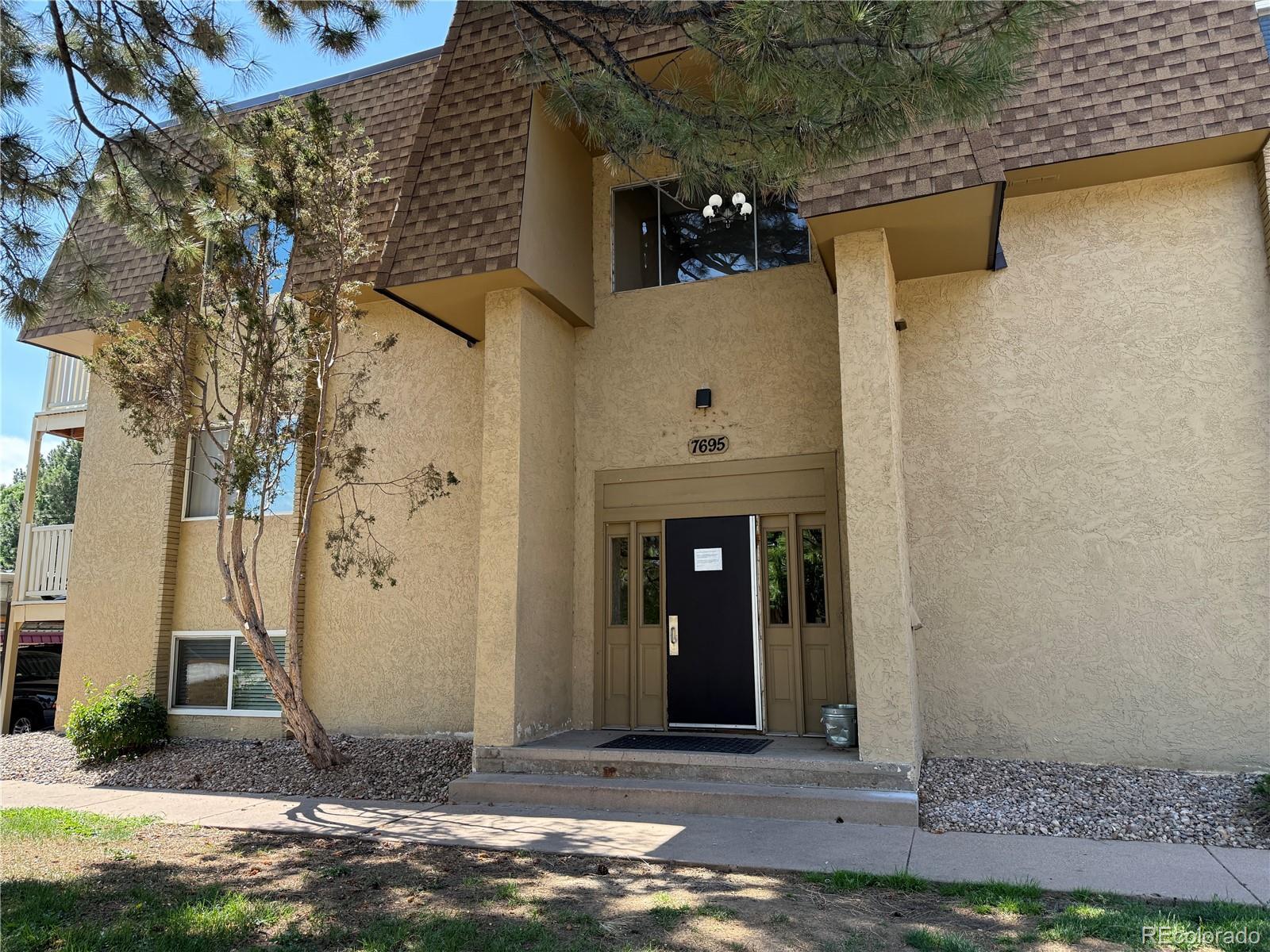 Property Photo: 7695 E Quincy Avenue 207 CO 80237