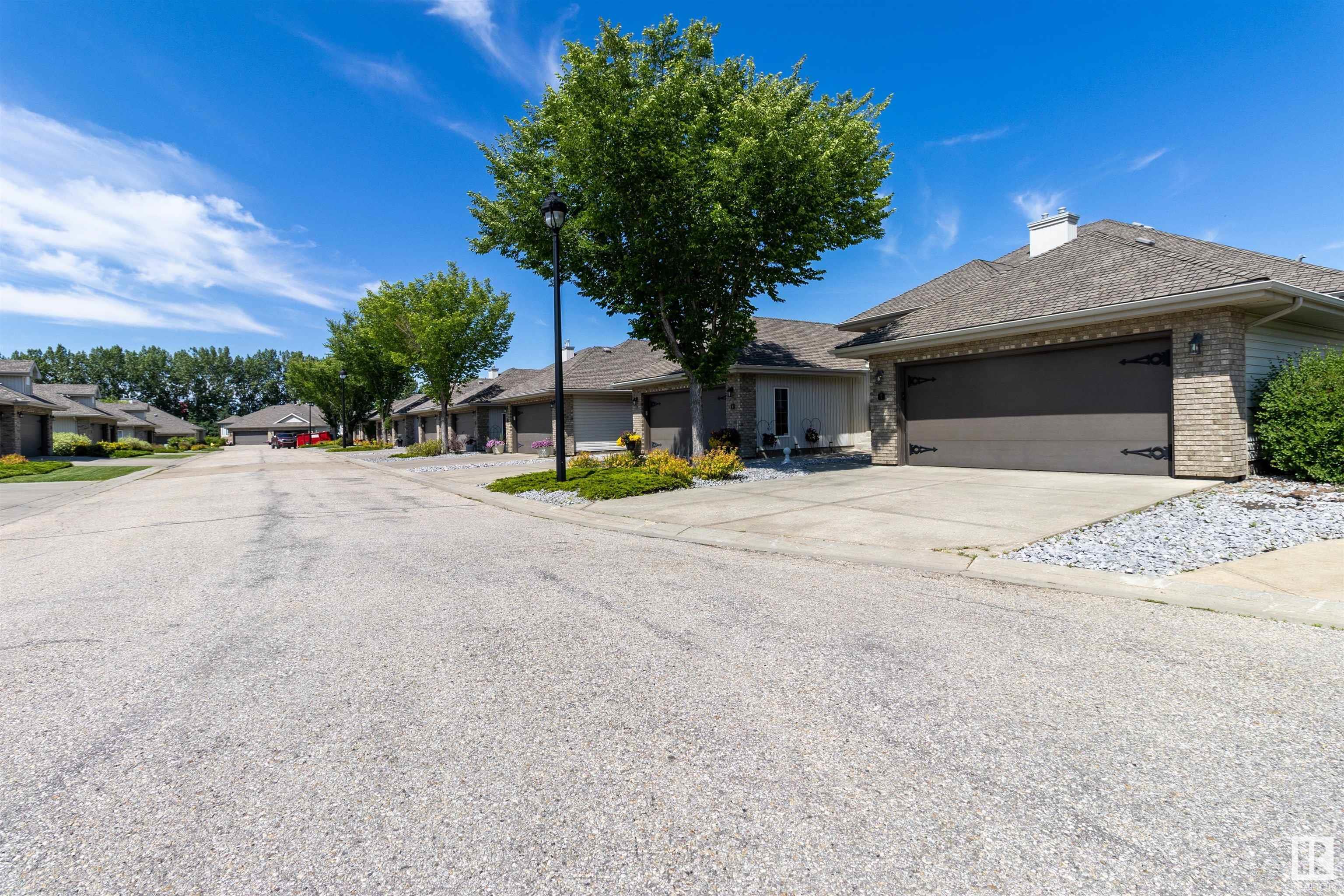 Property Photo:  10848 8 Avenue SW 7  AB T6W 1G5 