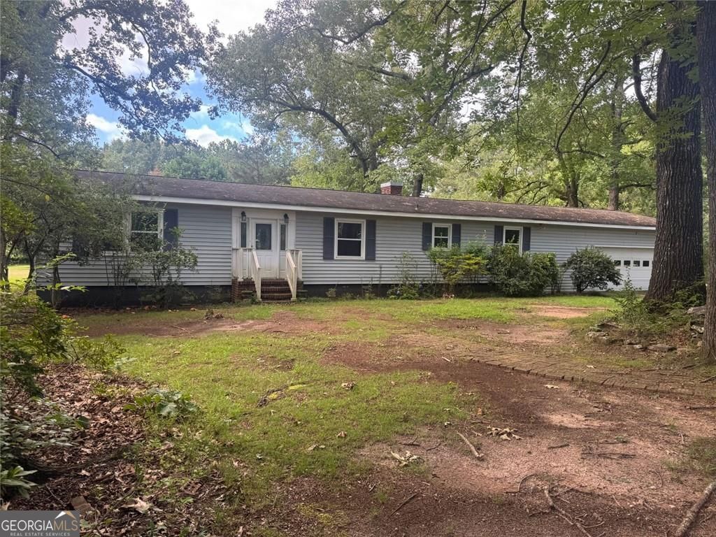 Property Photo:  2550 Highway 20 East  GA 30252 