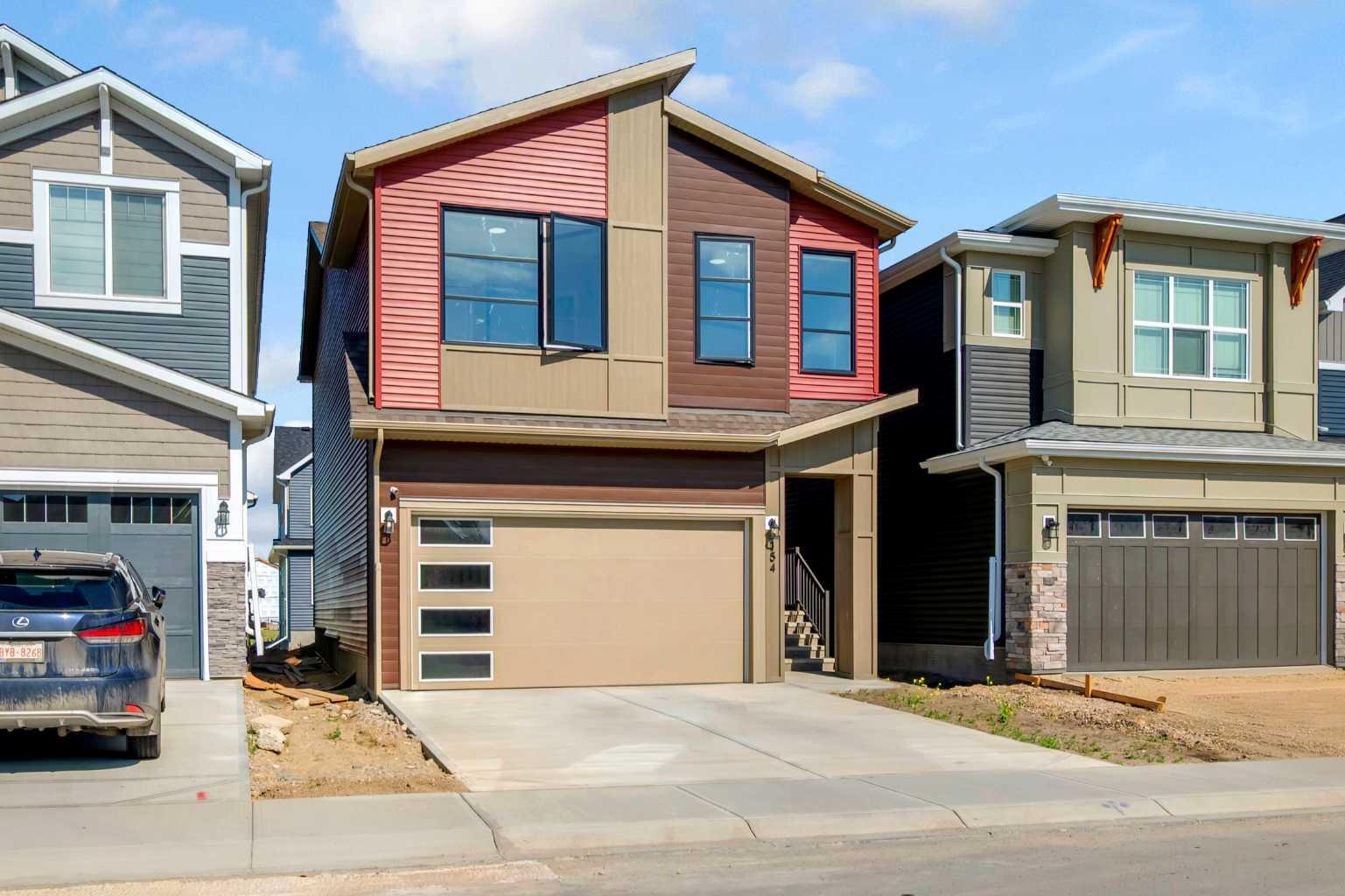 Property Photo: 154 Silver Spruce Grove SW AB T2X 5M2