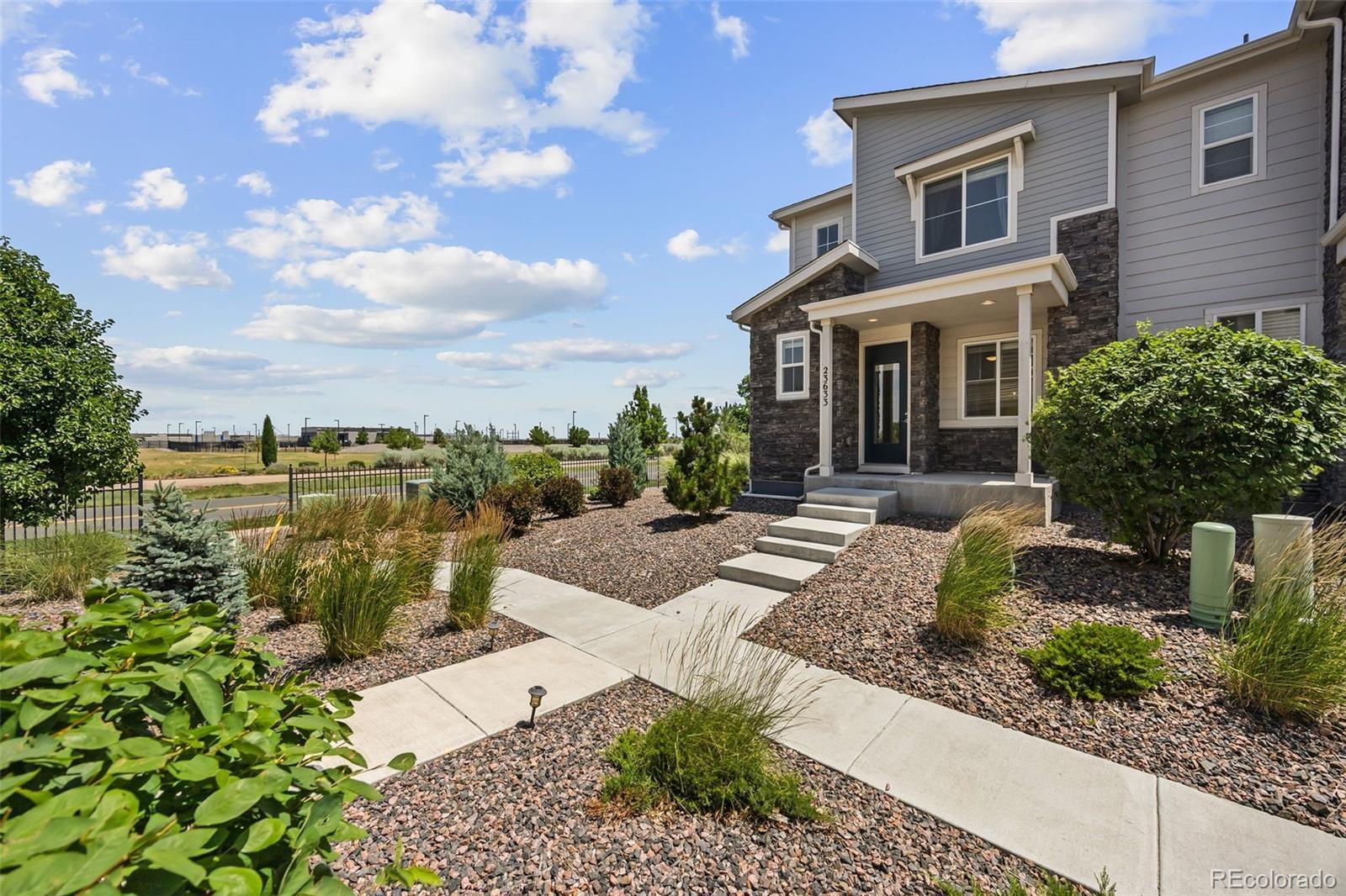 Property Photo: 23633 E 5th Drive CO 80018