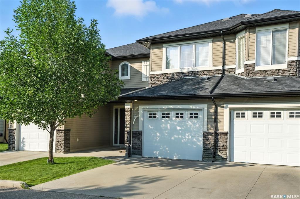 Property Photo: 410 Ledingham Way 304 SK S7V 0C4