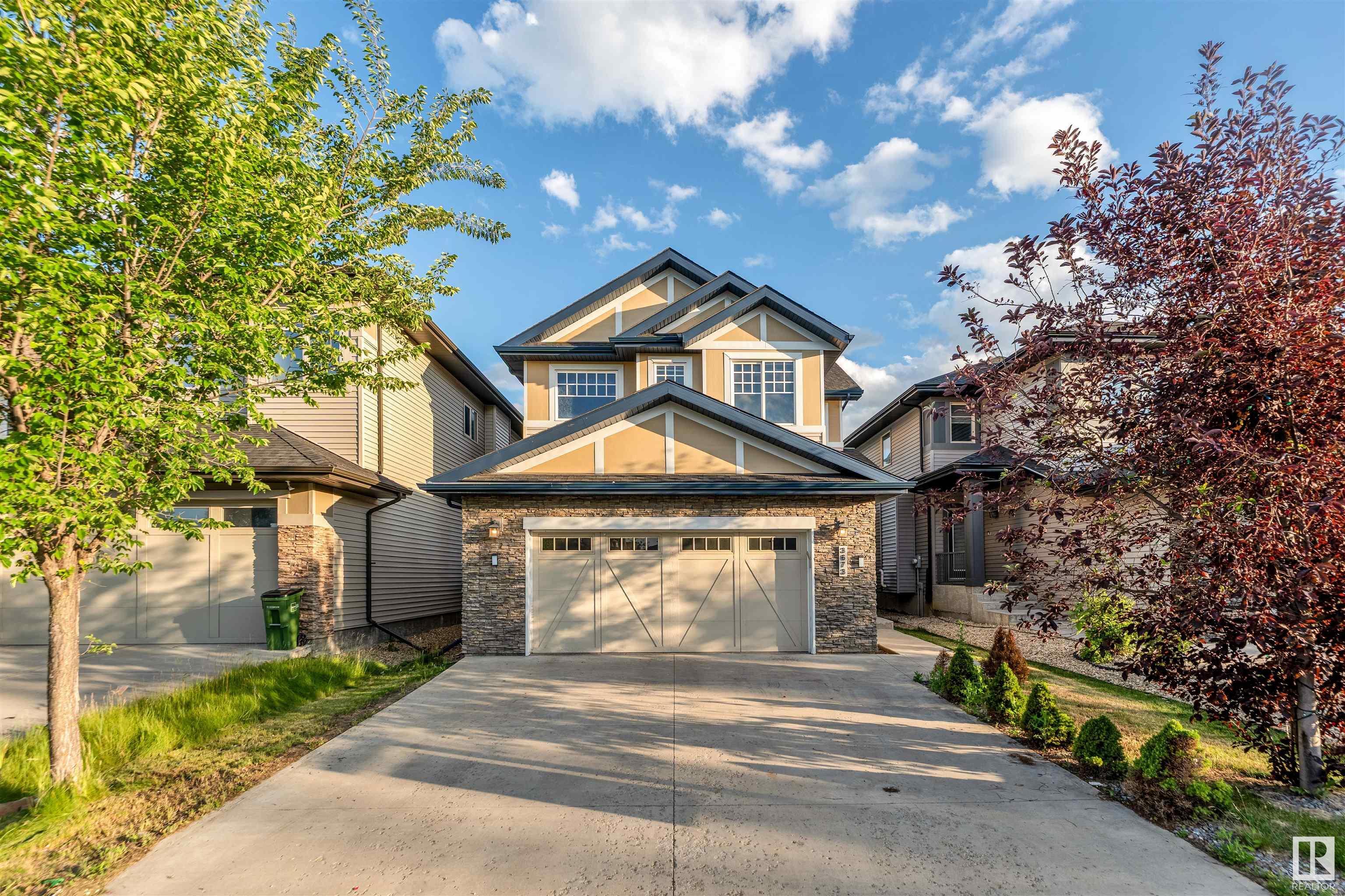Property Photo: 3673 Allan Drive SW AB T6W 2K3