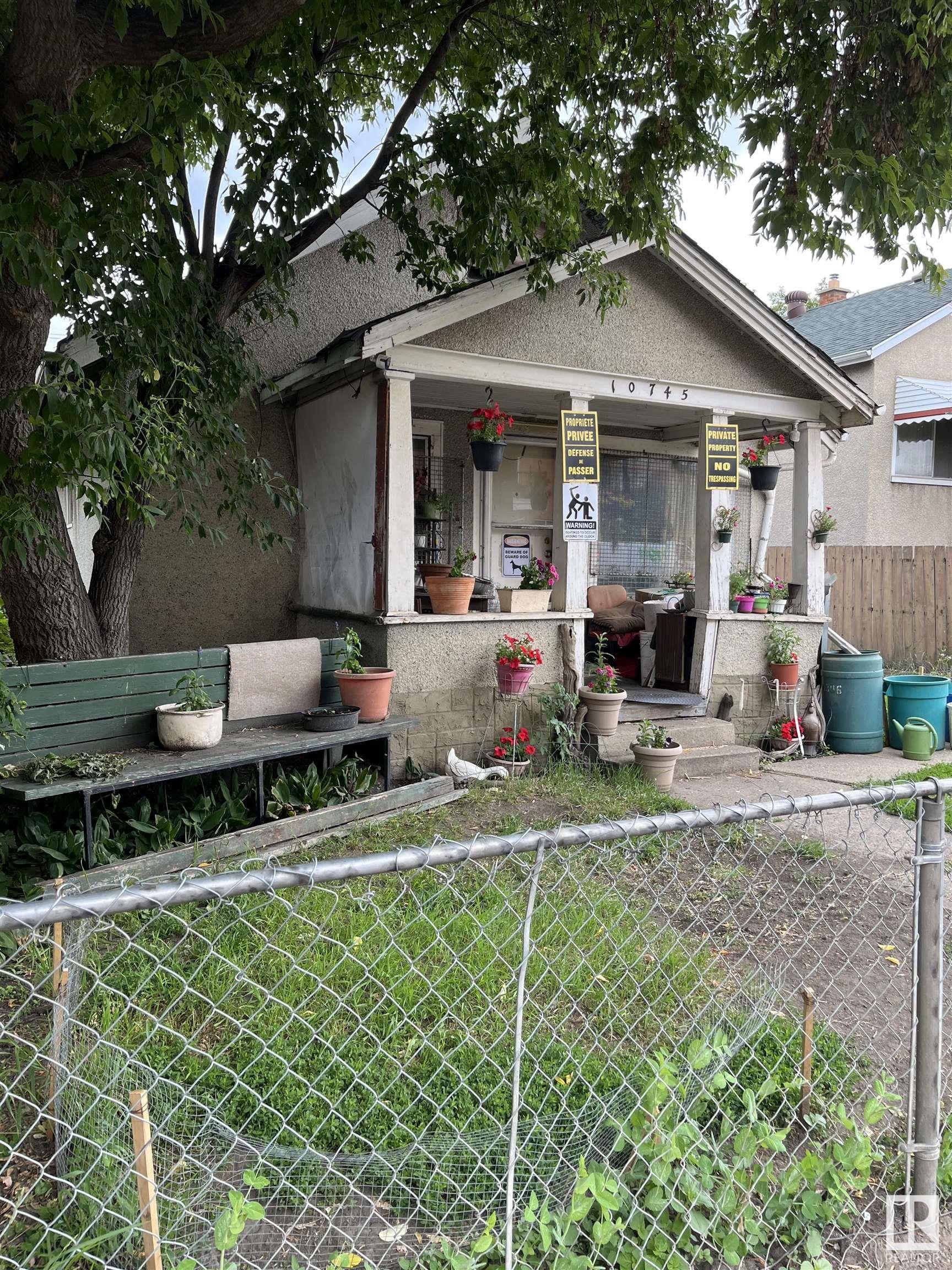 Property Photo:  10745 95 Street NW  AB T5H 2E1 