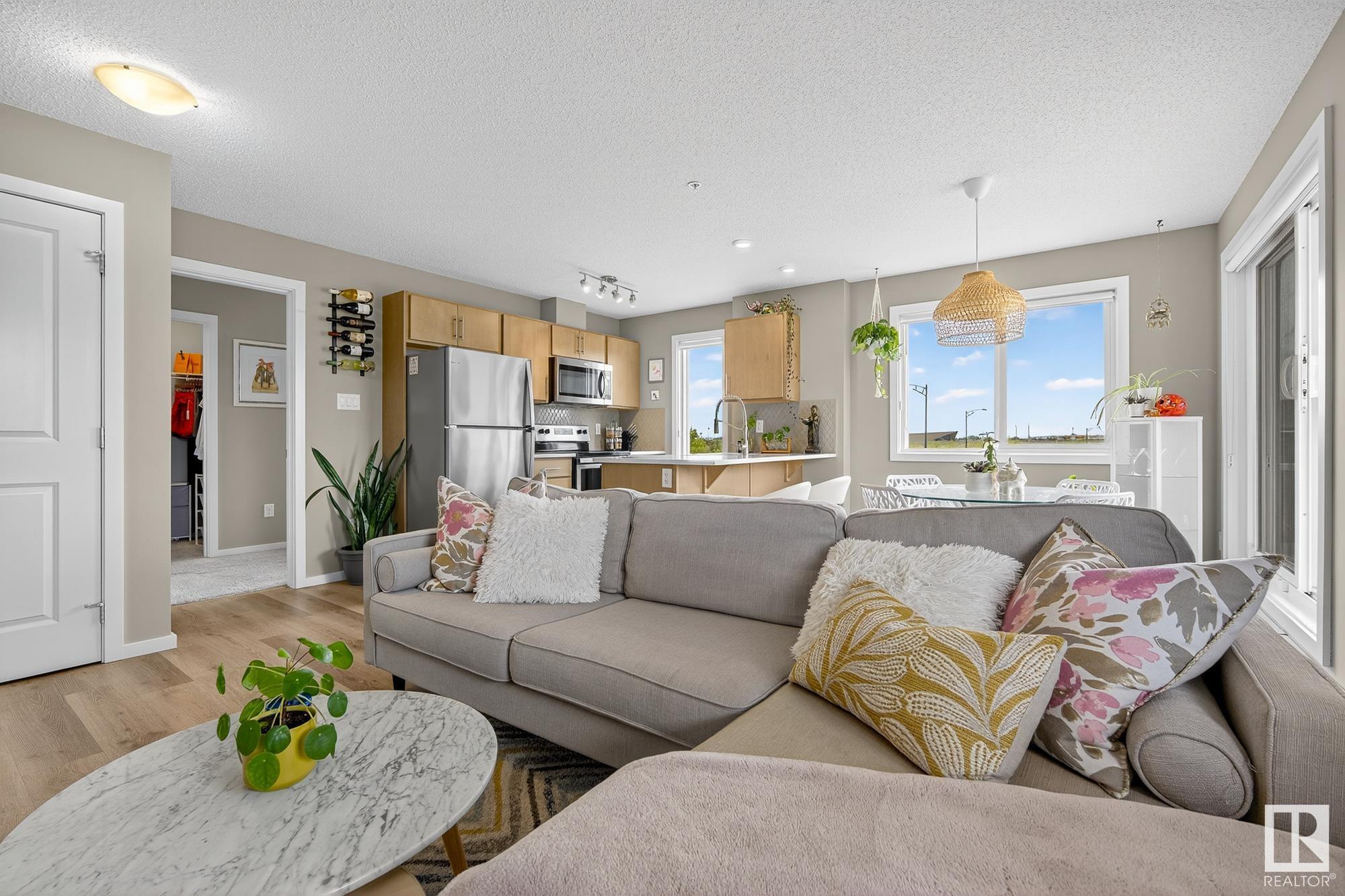 Property Photo: 148 Ebbers Boulevard NW 237 AB T5Y 4A4