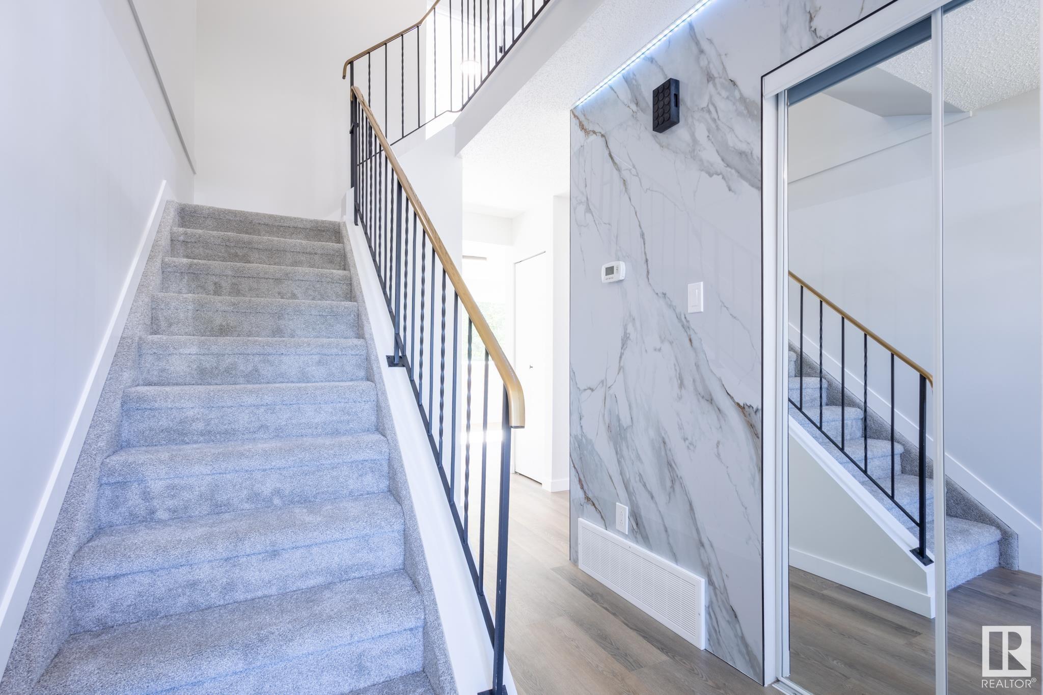 Property Photo:  1155 Hooke Road NW  AB T5A 4A5 