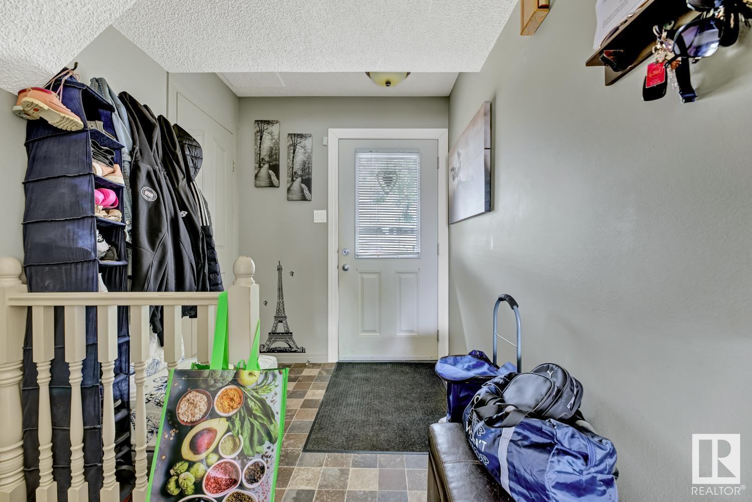 Property Photo:  11406 139 Avenue NW  AB T5X 3L4 