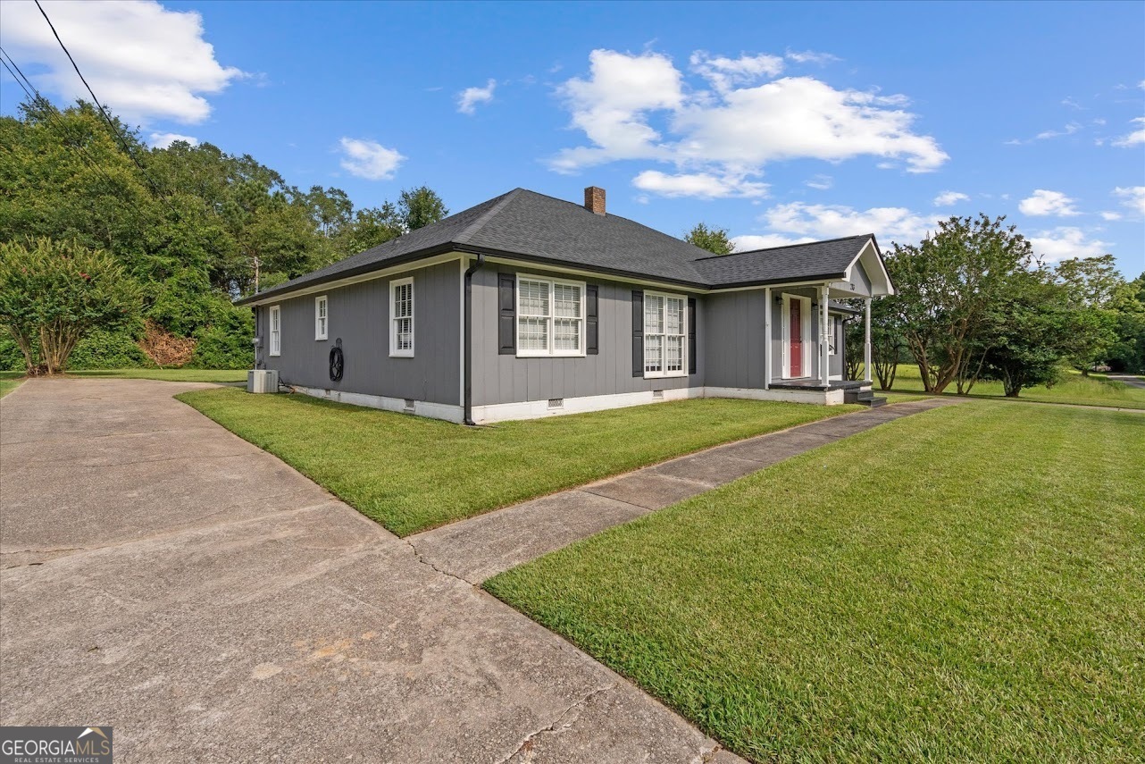 Property Photo: 213 Poplar Street GA 30108