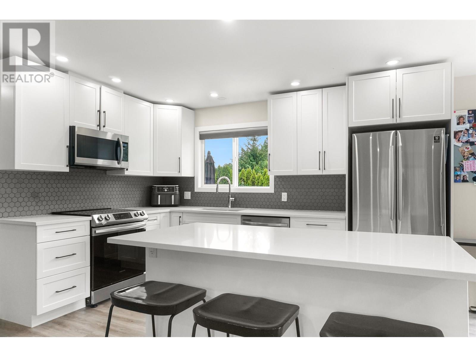 Property Photo:  5125 Medeek Avenue  BC V8G 1C9 