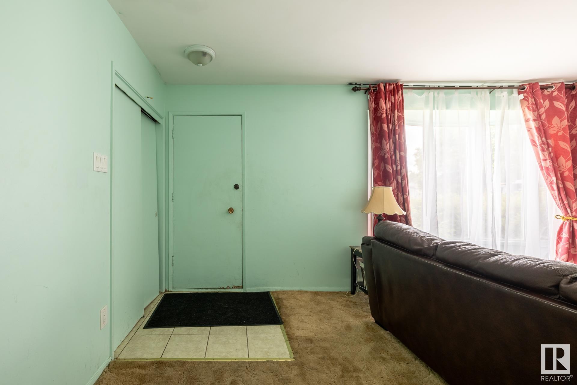 Property Photo: 13303 58 Street NW AB T5A 0P9