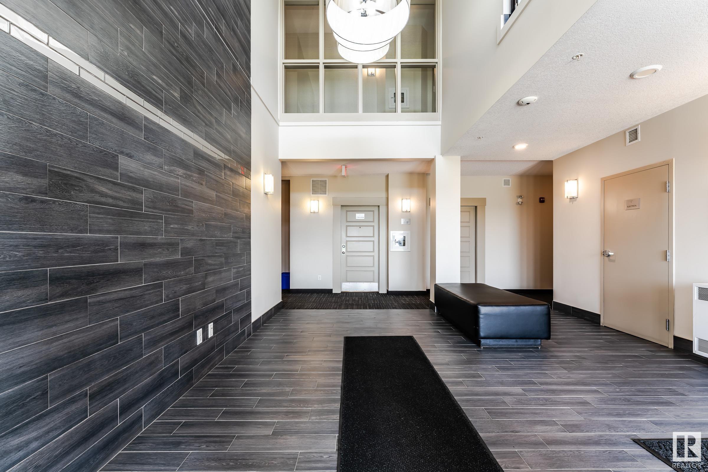 Property Photo: 320 Ambleside Link SW 408 AB T6W 2Z9