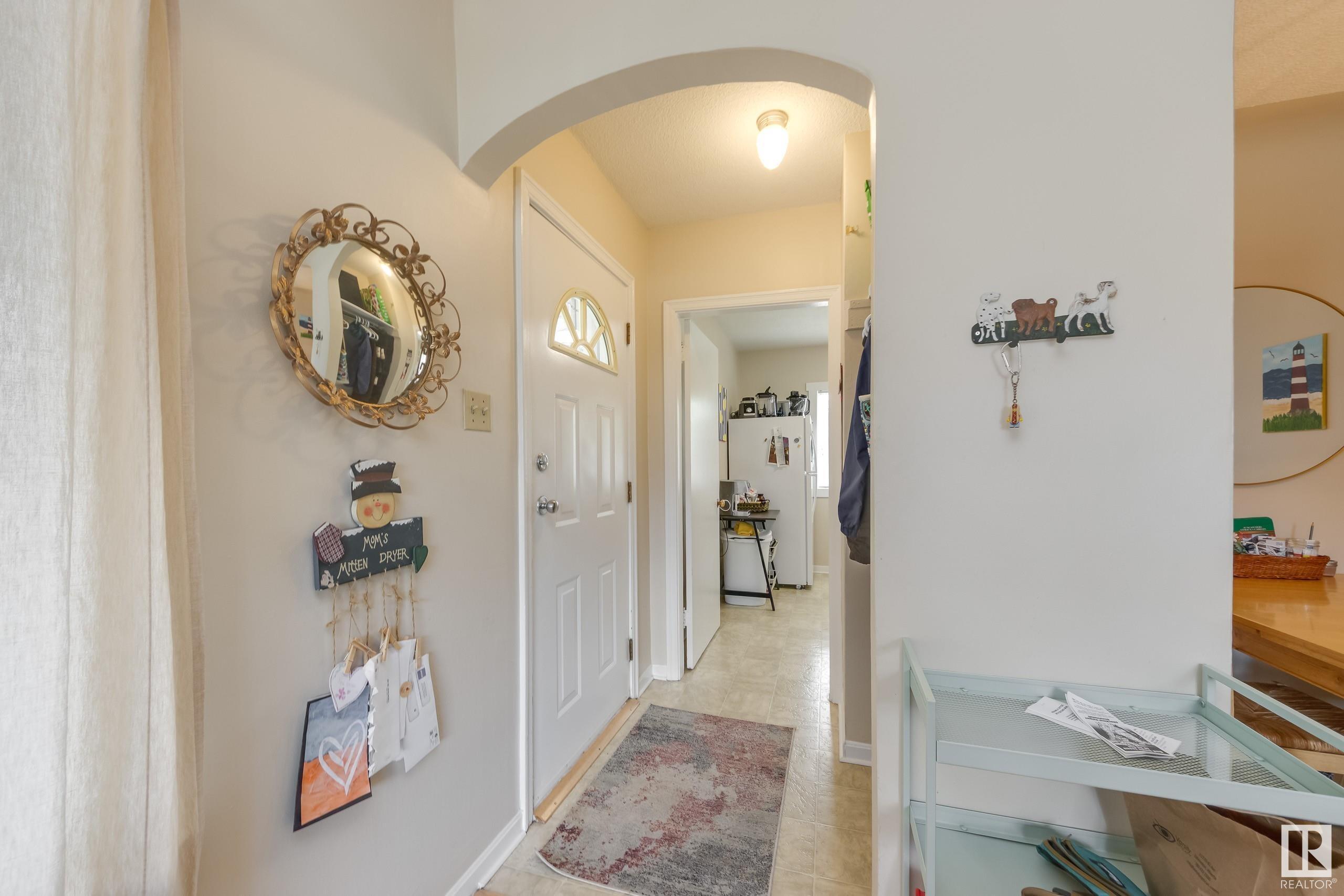 Property Photo:  9909 87 Avenue NW  AB T6E 2N8 