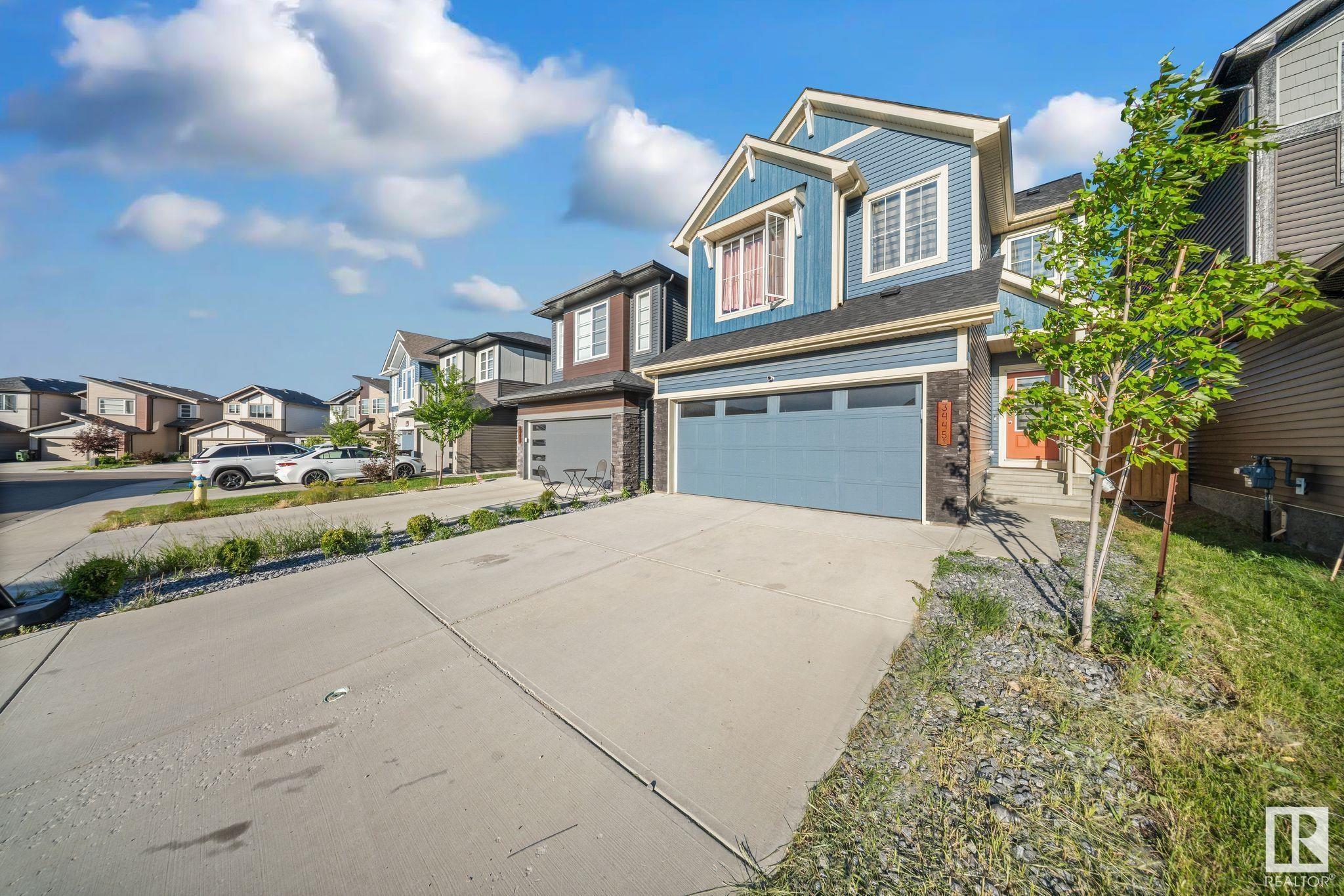 Property Photo: 3445 Checknita Terrace SW AB T6W 4W5