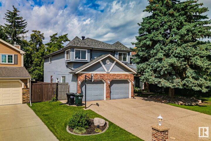 Property Photo:  122 Village Downs  AB T8A 4L6 