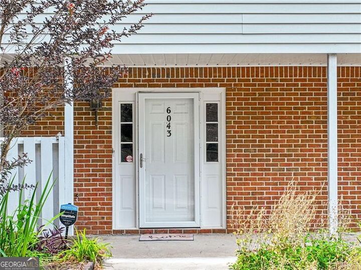 Property Photo:  6043 Wintergreen Road  GA 30093 