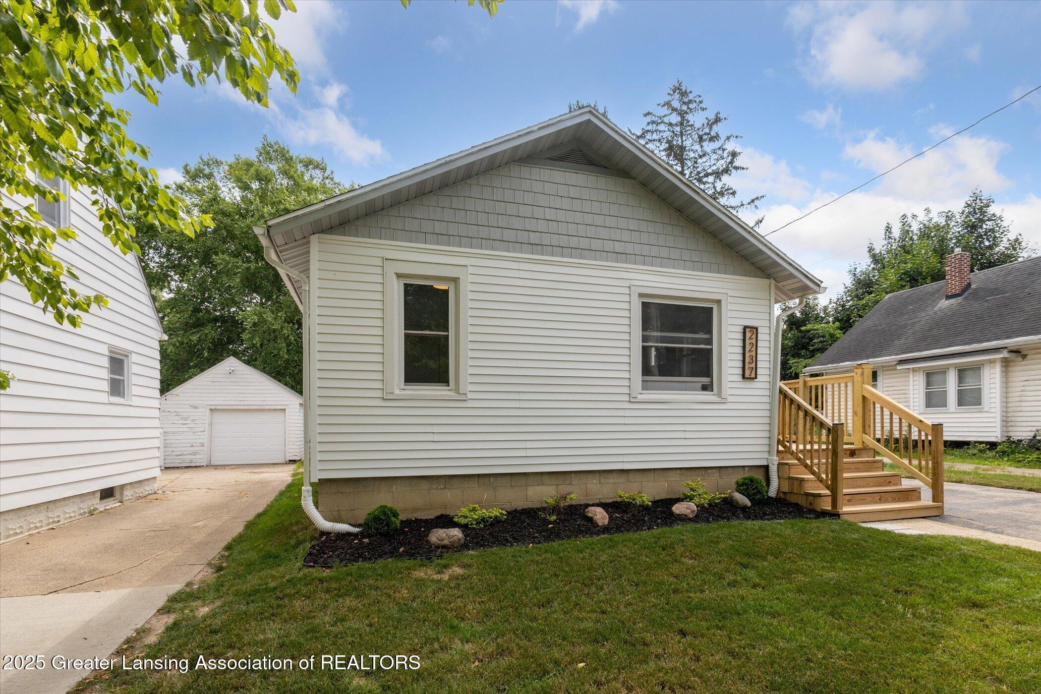Property Photo:  2237 Sunnyside Avenue  MI 48910 