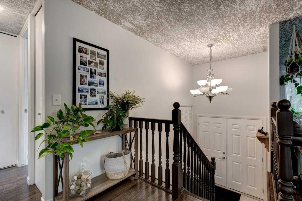 Property Photo:  2835 Cedar Ridge Drive SW  AB T2W 2B2 