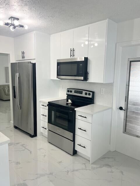 Property Photo:  1902 SW Roma Way  FL 33426 