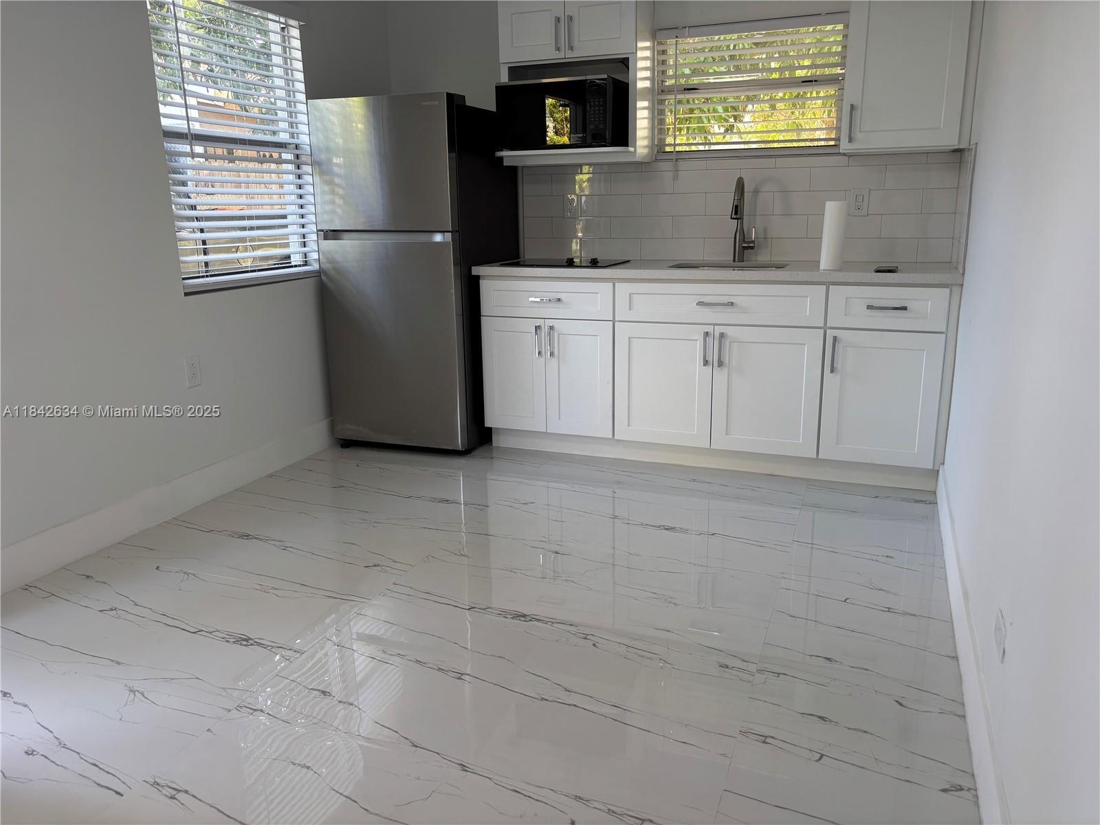 Property Photo:  214 NW 46th Ave 214  FL 33126 