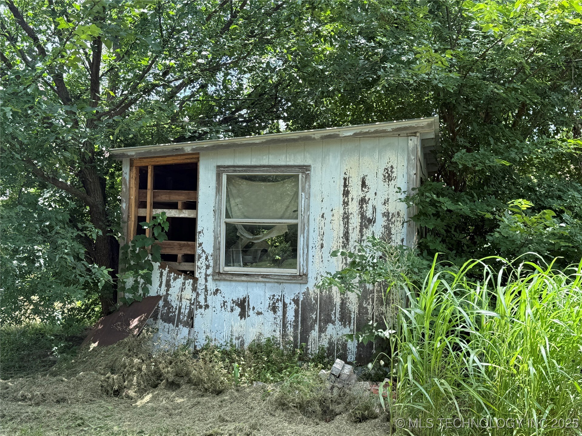 Property Photo: 1123 E Pecan OK 74023