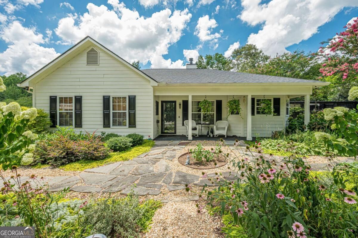 Property Photo:  7820 Silversmith Drive  GA 30028 